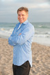 Photo: Attractive business man on the beach Attractive business man on the beach
