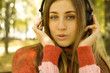 Girl with headphones fall