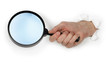 Magnifying glass in hand Magnifying glass in hand