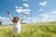 Girl and Windfarm