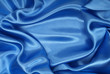 Smooth elegant blue silk as background Smooth elegant blue silk as background