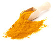 turmeric over the spoon,  isolated on white background
