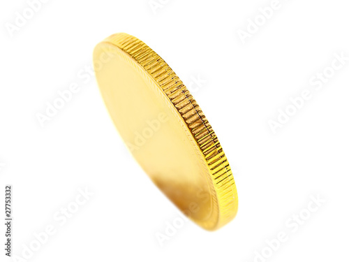 Photo: gold chocolate coin isolated on white background gold chocolate coin isolated on white background
