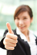 Bright portrait of lady showing thumb up
