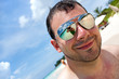 Tropical Beach Vacation - reflection of photographer in lens