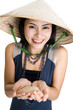 woman with rice in her hands