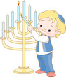 Jewish boy lighting Chanukah menorah