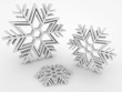 white 3d snowflakes on white background