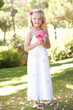 Portrait Of Bridesmaid Holding Bouquet Outdoors Portrait Of Bridesmaid Holding Bouquet Outdoors