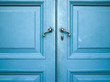 old double door painted with blue old double door painted with blue