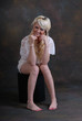 Pretty blond girl in white lace