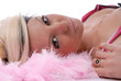 Cute young woman and feather boa