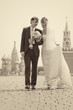 Young wedding couple walking