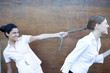 Young businesswomen in a duel