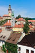 Cesky Krumlov cityscape with castle, tower and old houses