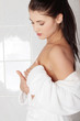 Woman examining her breast