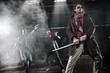 Aggressive men with weapons