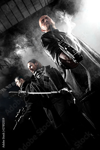 Photo: Handsome men with weapons Handsome men with weapons