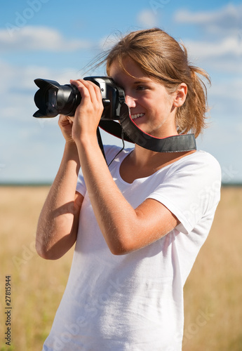 Photo: girl taking photo with camera girl taking photo with camera