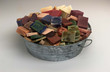 many bars of cut soaps in a tin bucket many bars of cut soaps in a tin bucket