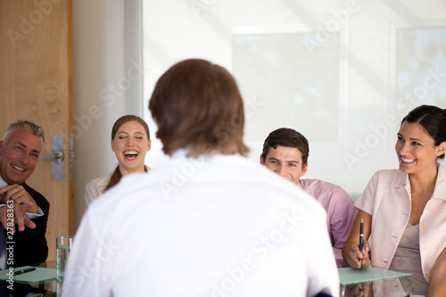 Photo: Unemployed man being made fun of Unemployed man being made fun of