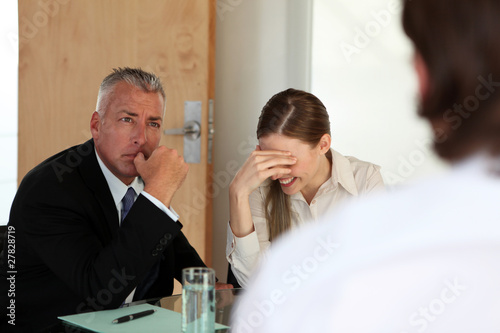Photo: Tense job interview Tense job interview