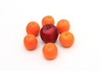 Clementines with a Red Apple