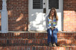 Pretty Teen Girl Sits on Front Steps Pretty Teen Girl Sits on Front Steps