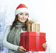 Beautiful Santa Girl with Christmas Holidays Gifts