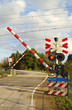 Railroad crossing on a winding road