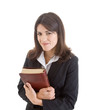Photo: Smiling Caucasian Woman Holding Bible Closely Isolated White = Smiling Caucasian Woman Holding Bible Closely Isolated White =