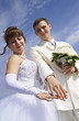 The bride and groom boast rings