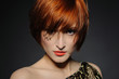 Beautiful red heaired woman portrait with fashion hairstyle and