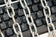 Computer security concept with keyboard and chain Computer security concept with keyboard and chain