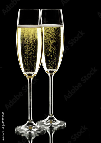 Photo: two glasses of sparkling wine two glasses of sparkling wine