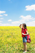 Little girl explores nature