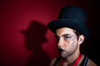 Makeup on man in top hat