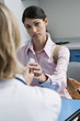 Patient taking medicine from doctor
