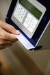 Hand scanning card through machine