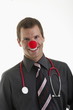 Foto: Doctor with stethoscope and clown's nose Doctor with stethoscope and clown's nose