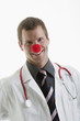 Foto: Doctor with stethoscope and clown's nose Doctor with stethoscope and clown's nose
