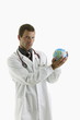 Doctor holding globe