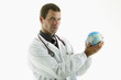 Doctor holding globe