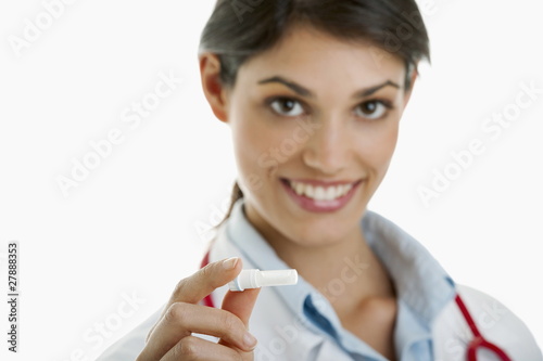 Photo: Doctor holding medicine device Doctor holding medicine device