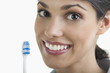 Young woman holding toothbrush