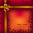 Big gold holiday bow on red Big gold holiday bow on red