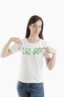 Young woman wearing 'I go green' tshirt