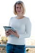 Woman holding a touchscreen table