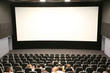 People in a modern cinema People in a modern cinema