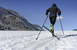 Mid adult man cross-country skiing in Allgau,
 Bavaria,
 Germany